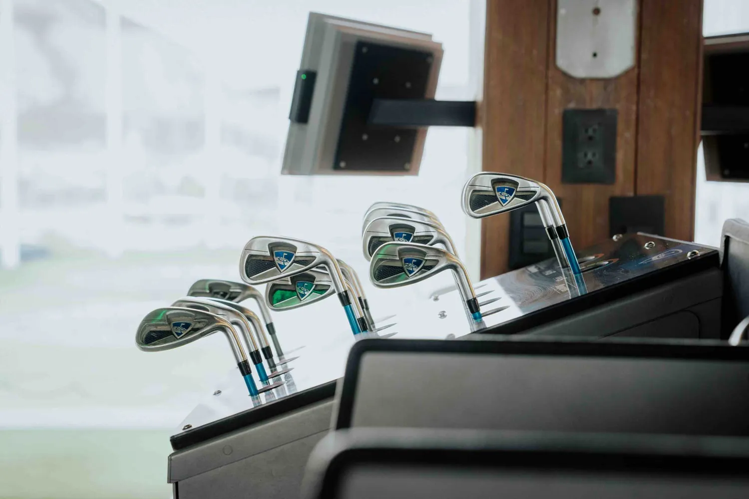 A custom club fitting on a launch monitor at American Golf Monument