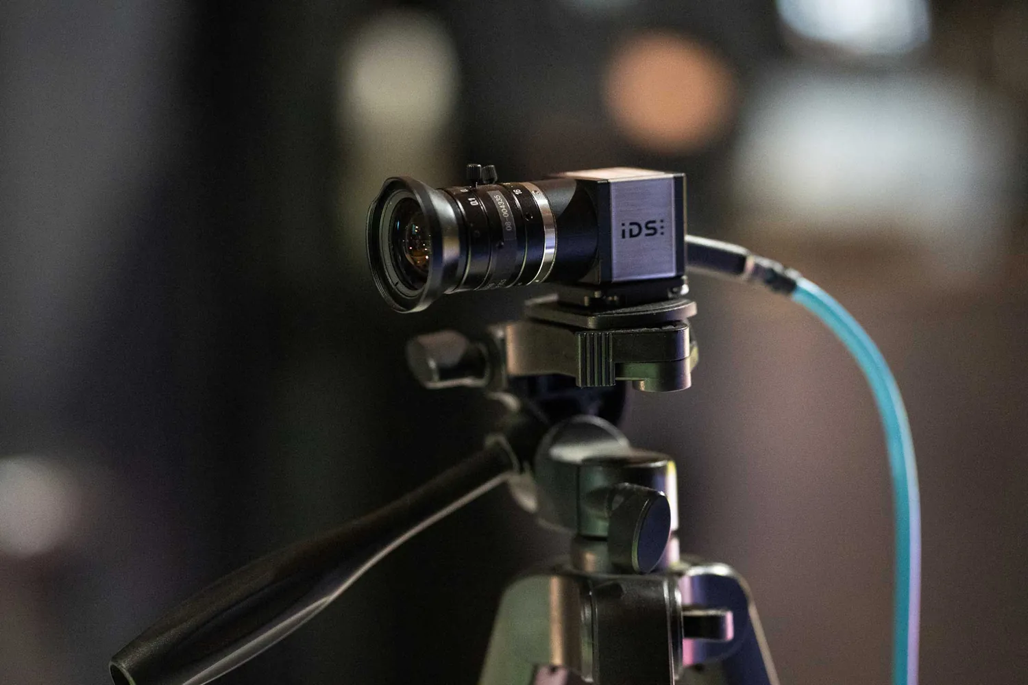 An HD camera in a private indoor bay at Grip Golf